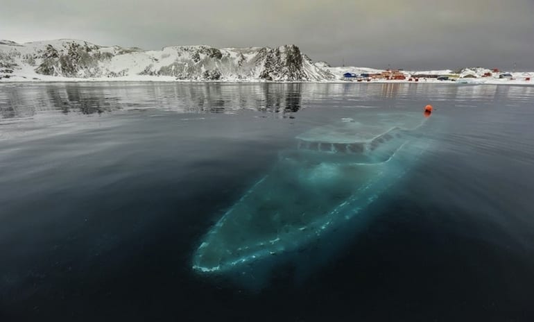 Sunken yacht in Antarctica - Most Beautiful Abandoned Places In The World